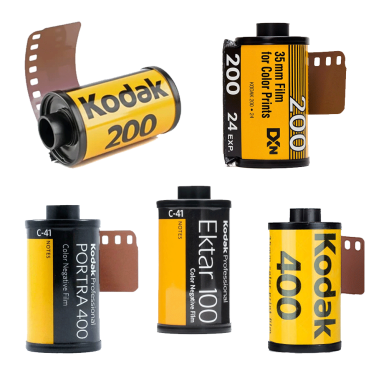 Kodak Films Various rolls of Kodak film in black and yellow packaging with different ISO ratings.